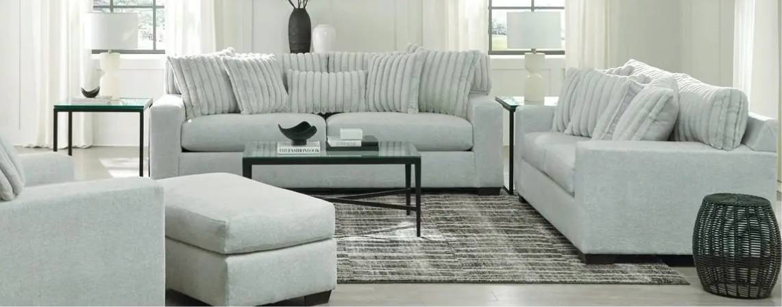 Modern living room with grey furniture set.