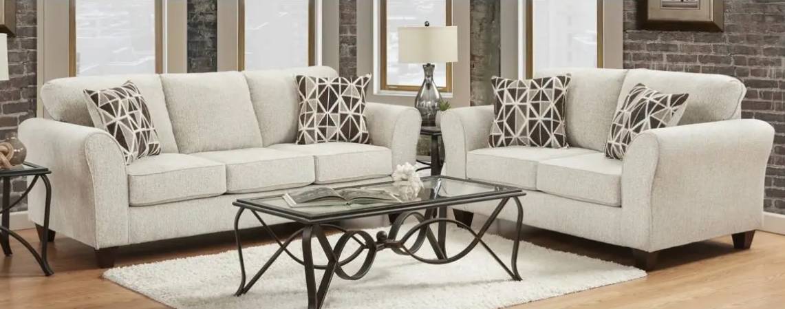 Modern living room with sofas and coffee table.