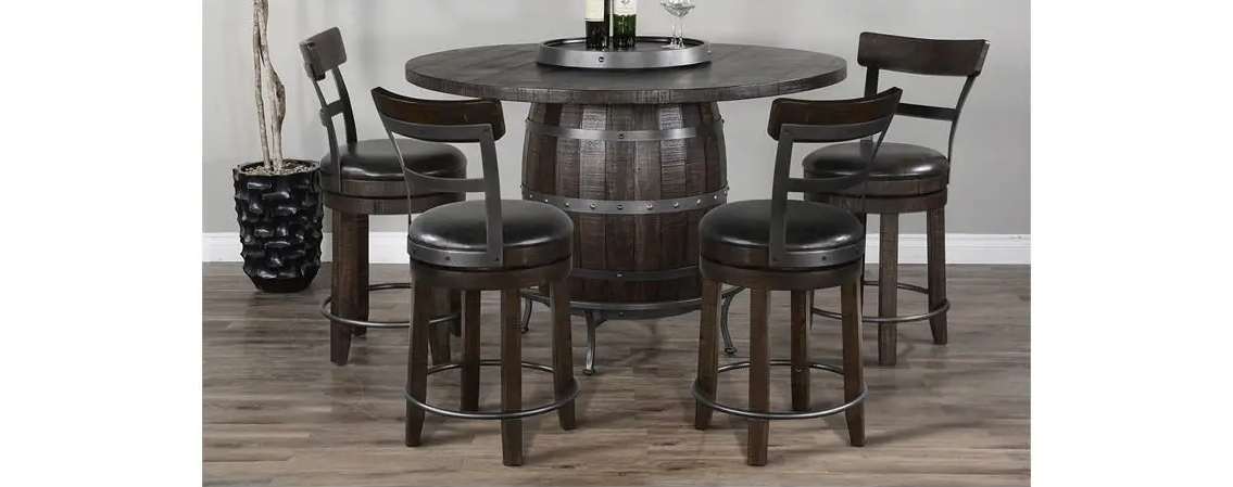 Barrel table with four matching bar stools.