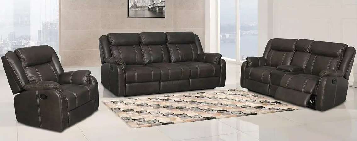 Brown leather recliner sofa set in living room.