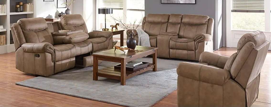 Living room with brown leather sofas and table.