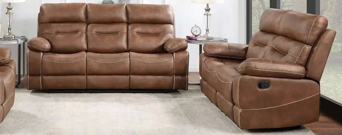 Brown leather reclining sofas in living room.