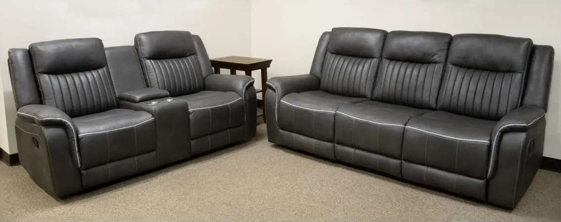 Gray leather sofas in a living room.