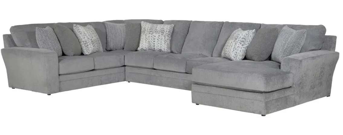Gray sectional sofa with decorative pillows.