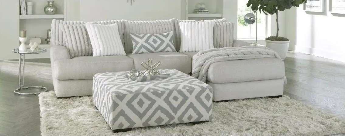 Modern living room with gray sectional sofa.