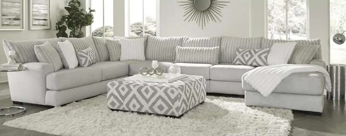 Modern living room with gray sectional sofa.